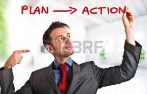 15216759-friendly-businessman-writing-his-simple-strategy-on-the-screen
